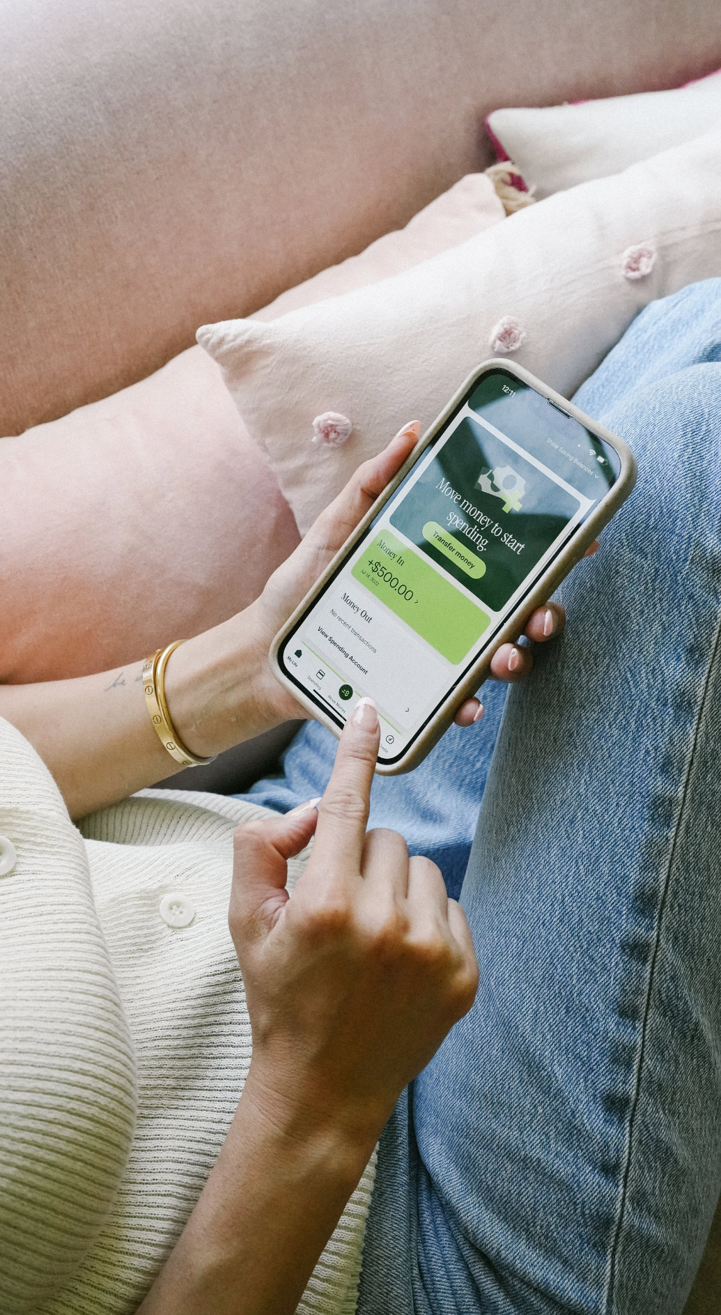 Close up of a customer managing their Spruce account on their cell phone.