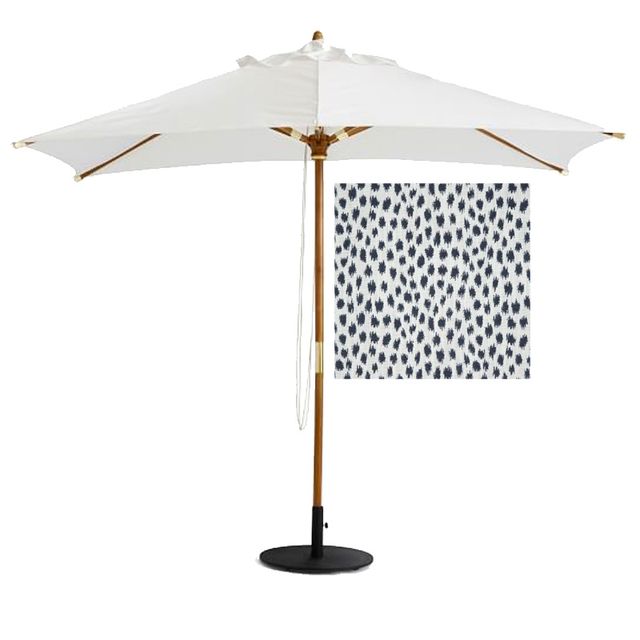 An outdoor umbrella shade next to a piece of 'test' fabric.